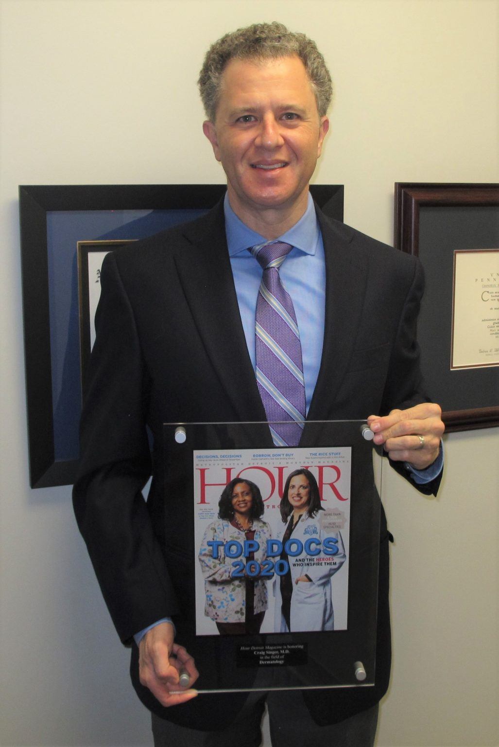 Dr. Craig Singer, board-certified dermatologist and founder of Acne Center of Michigan