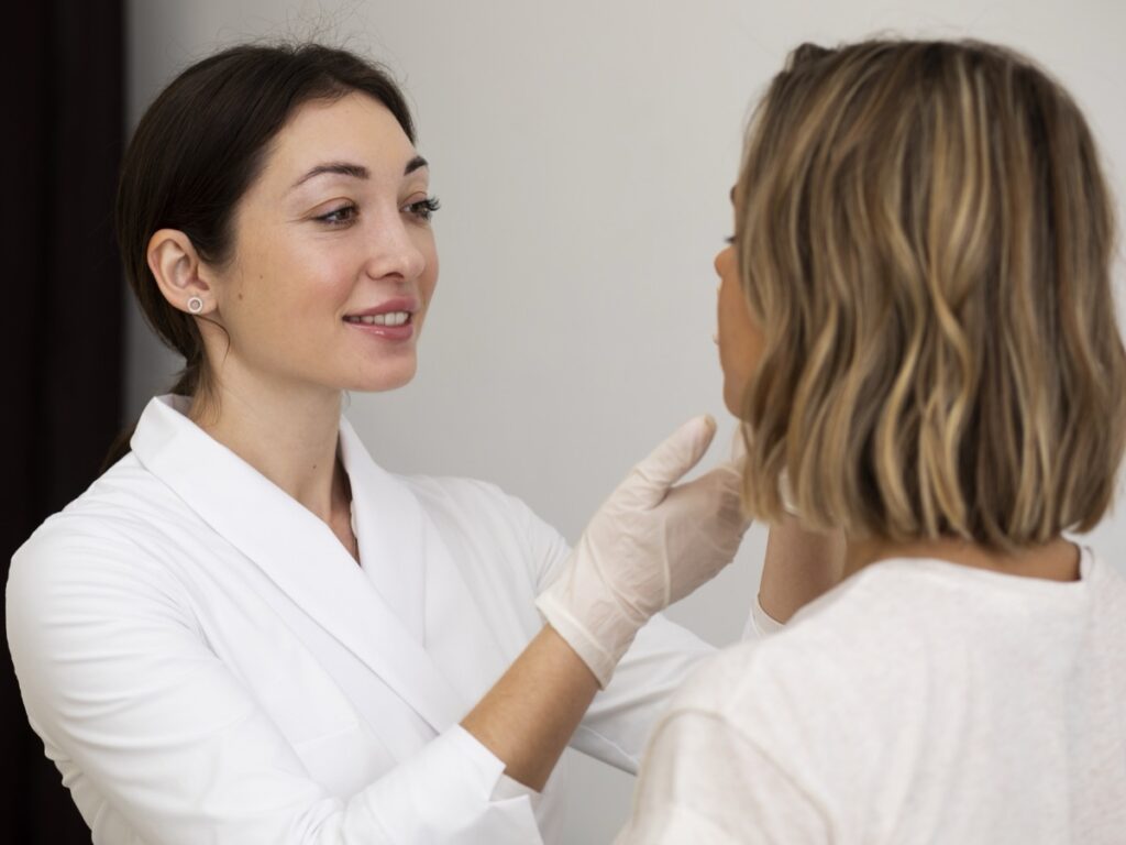 Doctor checking Adult Female Acne
